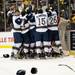 Notre Dame celebrates winning the CCHA Championship game against Michigan on Sunday, March 24. Daniel Brenner I AnnArbor.com